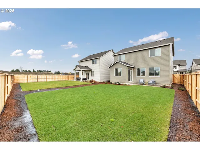 a bed room with a bed and a window
