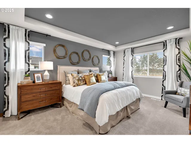 a bedroom with a bed and a couch