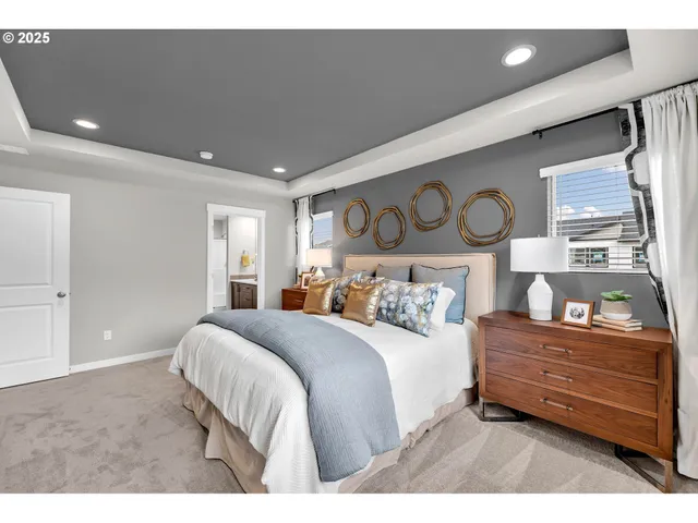 a bathroom with a sink double vanity and a mirror