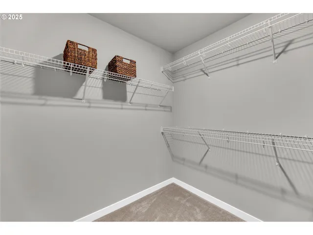 a bathroom with a sink double vanity and a mirror