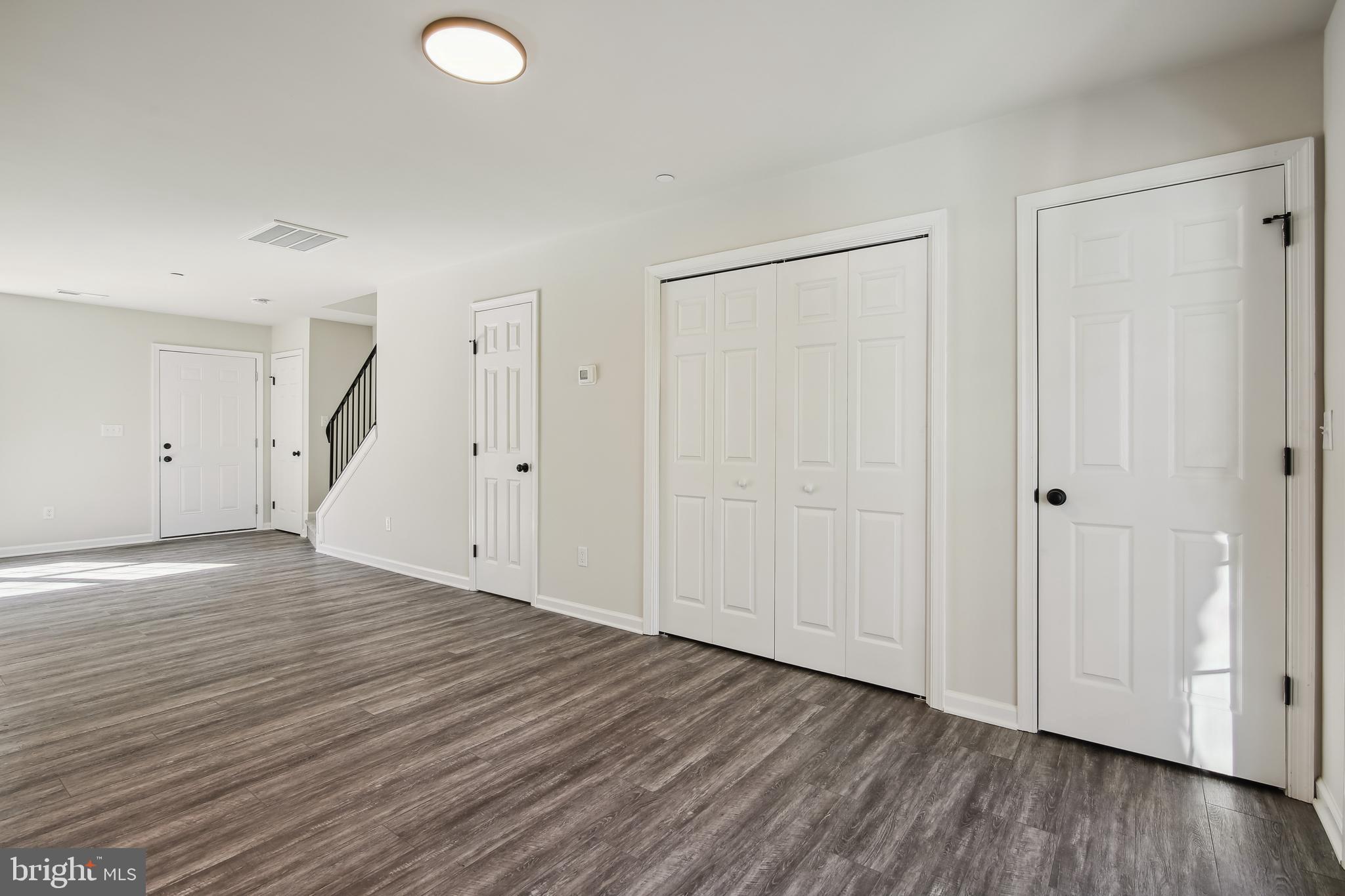 109 Metcalf Road Chestertown, MD 21620 - Photo 6 of 27 a view of an empty room with wooden floor and entryway