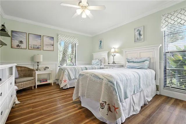 a bed room with a bed and a window