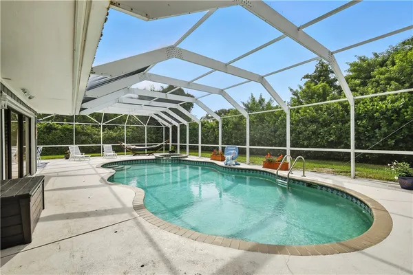 a view of a house with a swimming pool