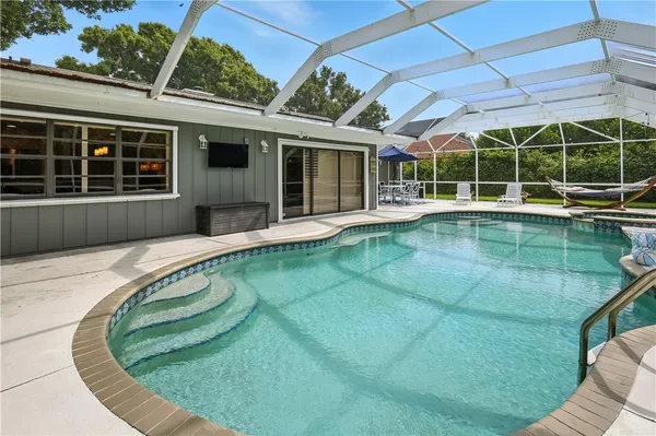 a view of a house with a swimming pool