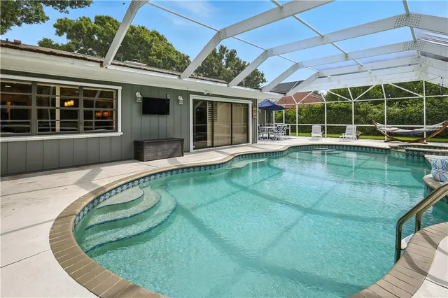 a view of a house with a swimming pool