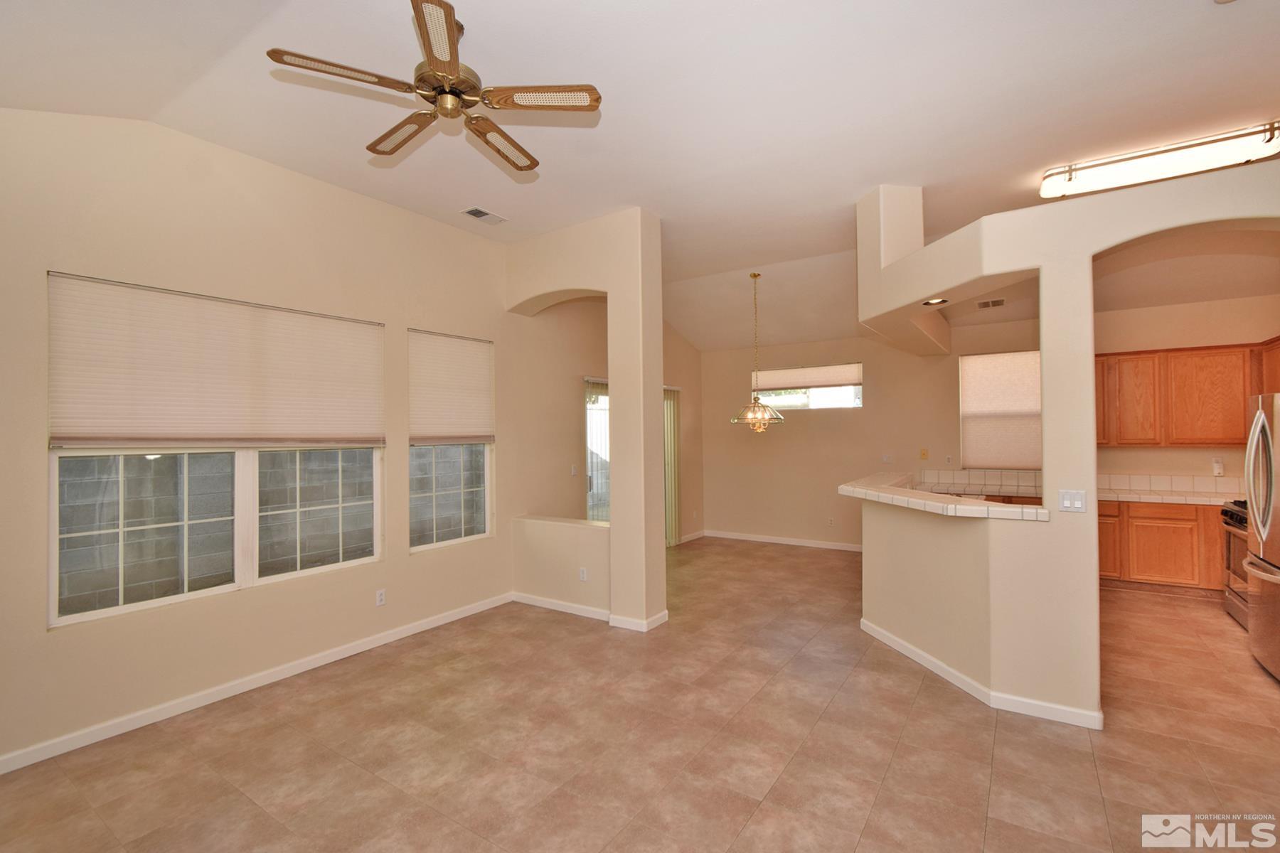 1201 Tule Drive Reno, NV 89521 - Photo 7 of 33 a view of a kitchen with a sink and a kitchen view