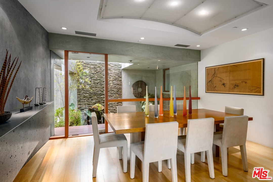2238 Stradella Road Los Angeles, CA 90077 - Photo 11 of 54 a view of a dining room with furniture window and outside view