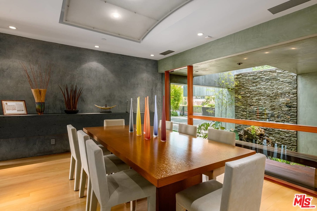 2238 Stradella Road Los Angeles, CA 90077 - Photo 12 of 54 a view of a dining room with furniture window and wooden floor
