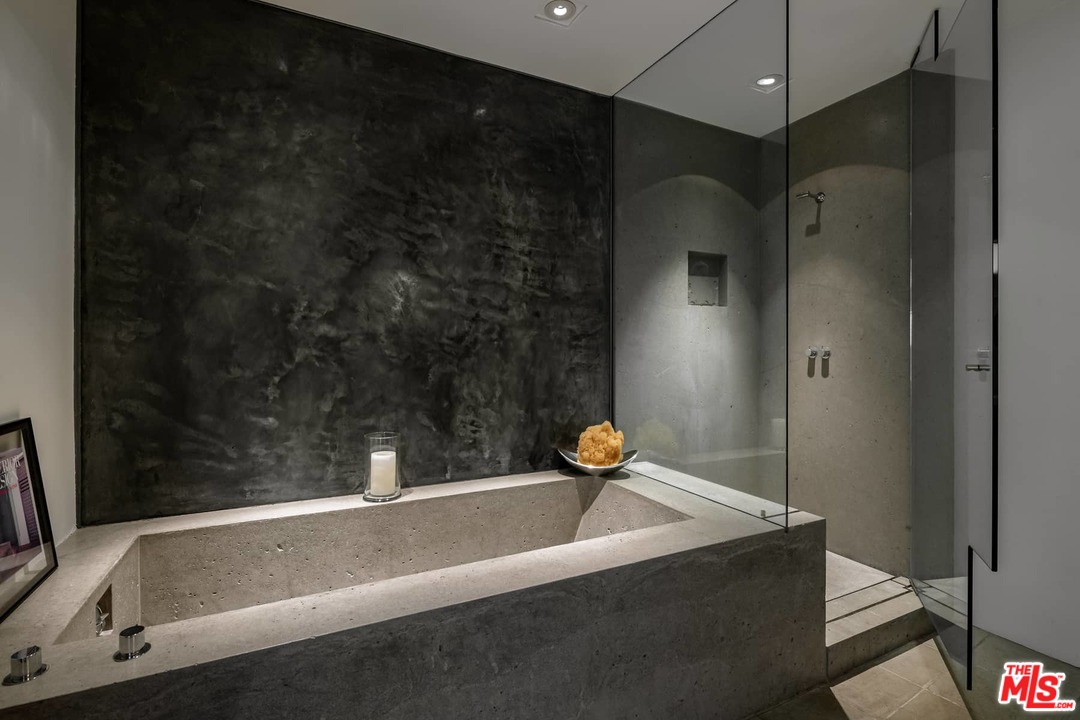 2238 Stradella Road Los Angeles, CA 90077 - Photo 27 of 54 a bathroom with a bathtub and a shower