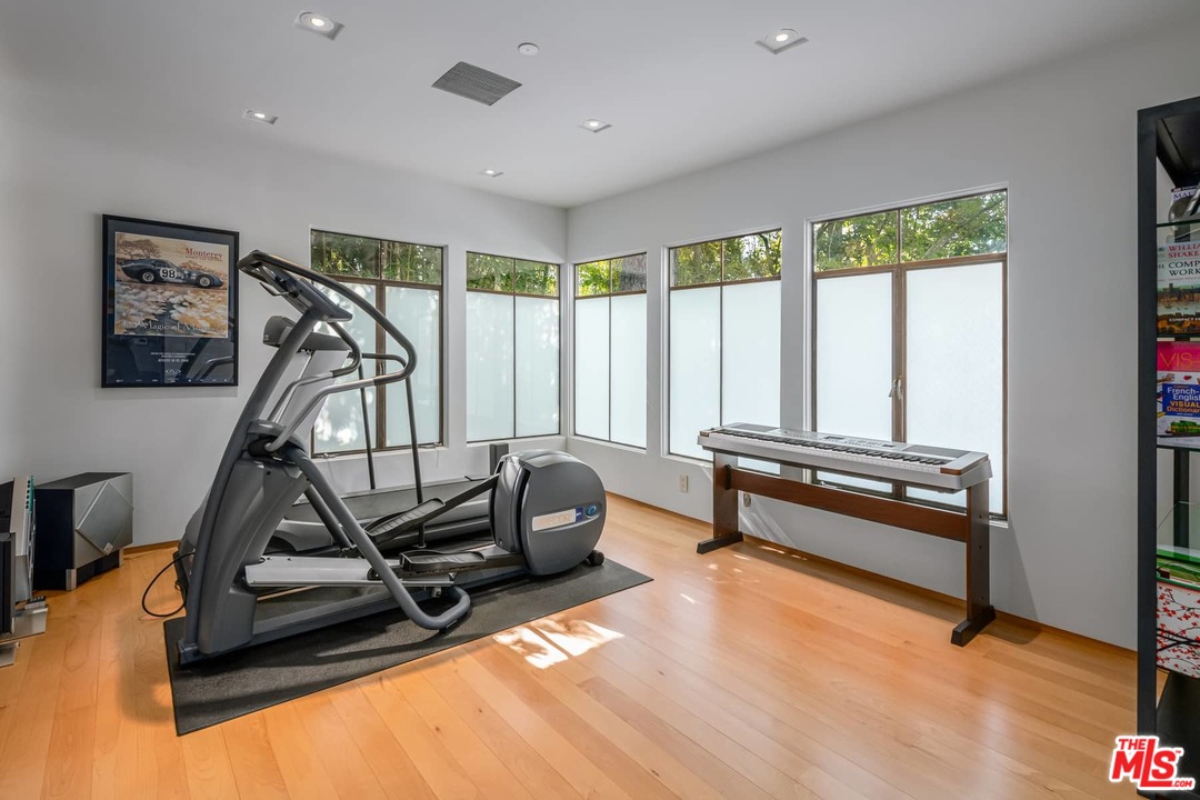 2238 Stradella Road Los Angeles, CA 90077 - Photo 28 of 54 a view of a room with gym equipment