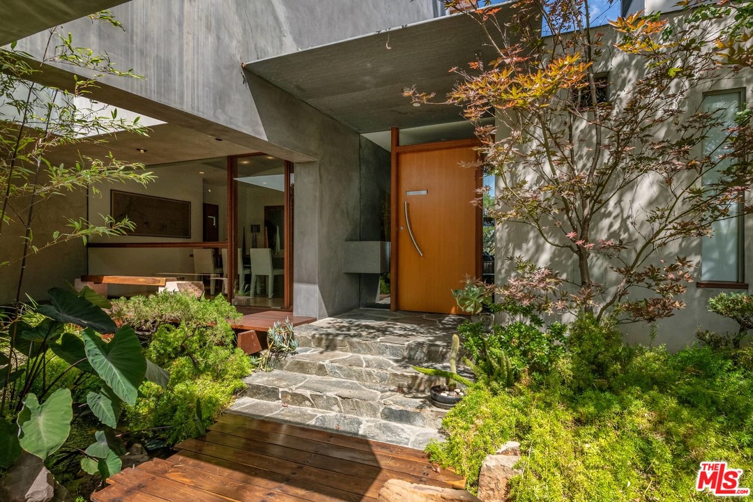 2238 Stradella Road Los Angeles, CA 90077 - Photo 4 of 54 a view of house with yard