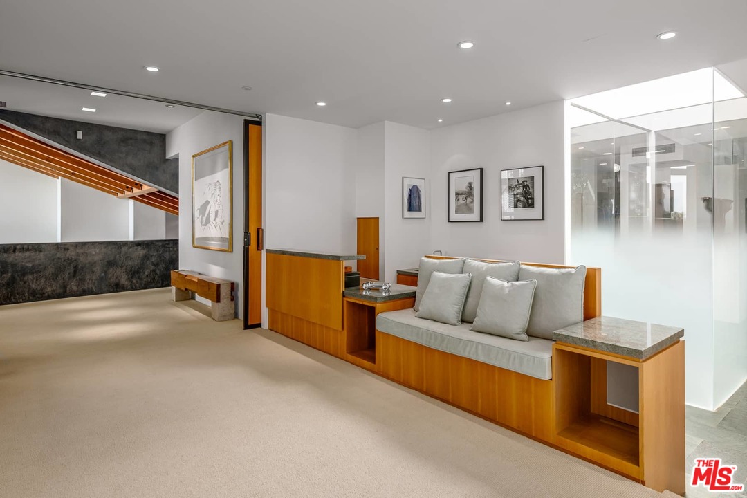 2238 Stradella Road Los Angeles, CA 90077 - Photo 31 of 54 a living room with furniture and a couch