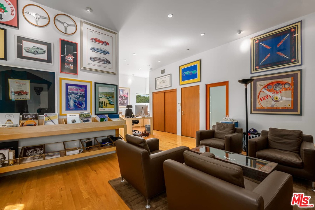 2238 Stradella Road Los Angeles, CA 90077 - Photo 42 of 54 a living room with furniture and a large window