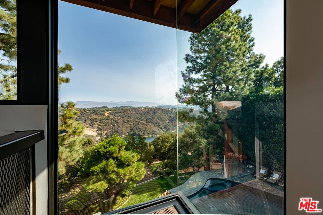 2238 Stradella Road Los Angeles, CA 90077 - Photo 46 of 54 a view of a yard from a balcony