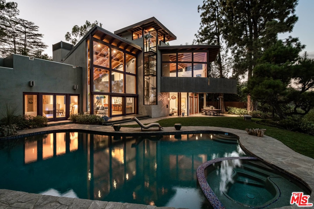 2238 Stradella Road Los Angeles, CA 90077 - Photo 53 of 54 a house that has tree in front of it