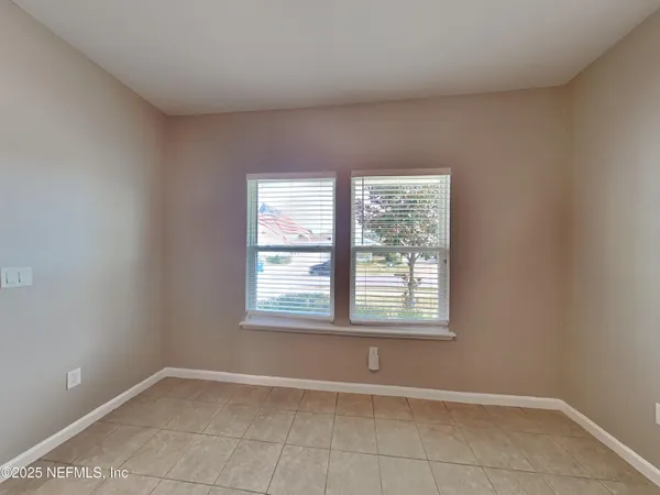 an empty room with a window