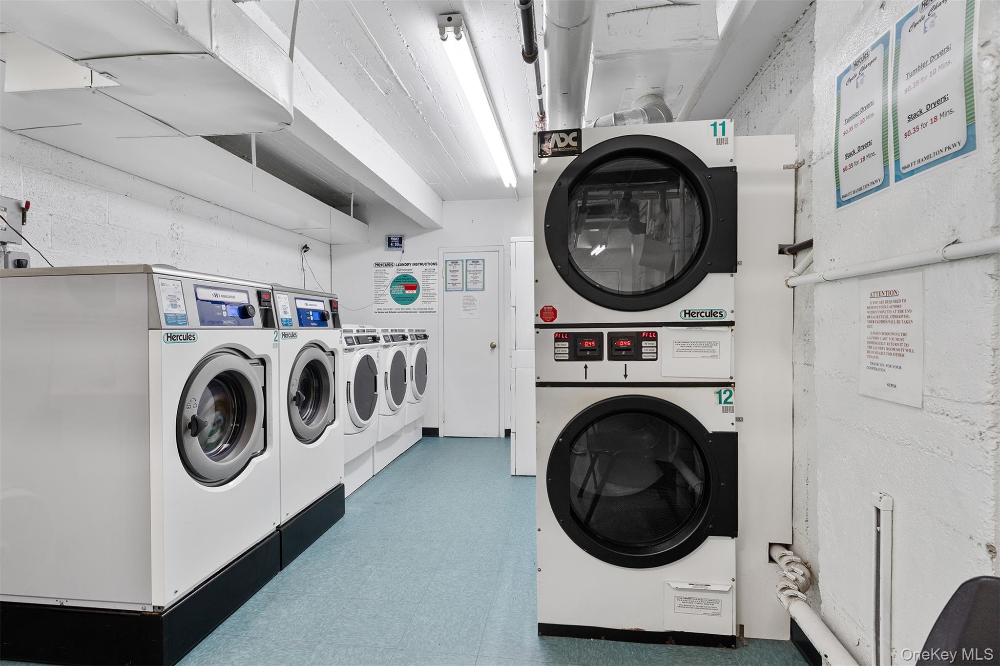 9040 Fort Hamilton Parkway, Unit 3 Brooklyn, NY 11209 - Photo 11 of 11 Communal laundry room featuring stacked washer / dryer and tile patterned floors