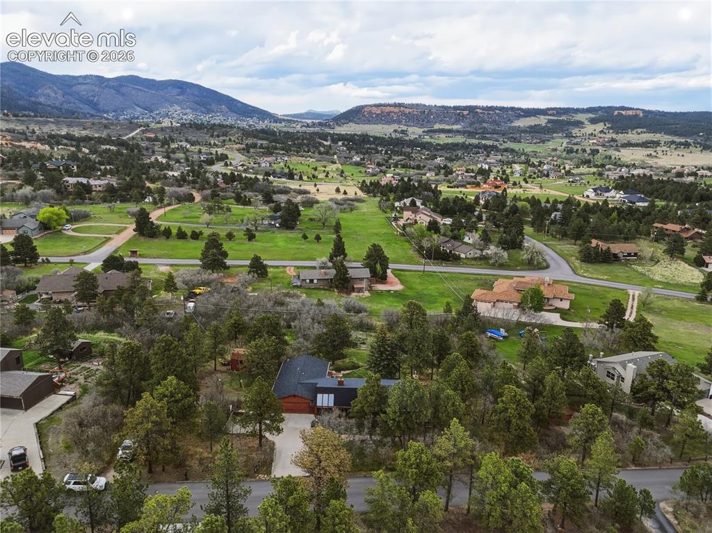 18190 Forest View Road Monument, CO 80132 - Photo 48 of 50 a view of a city with mountains in the background