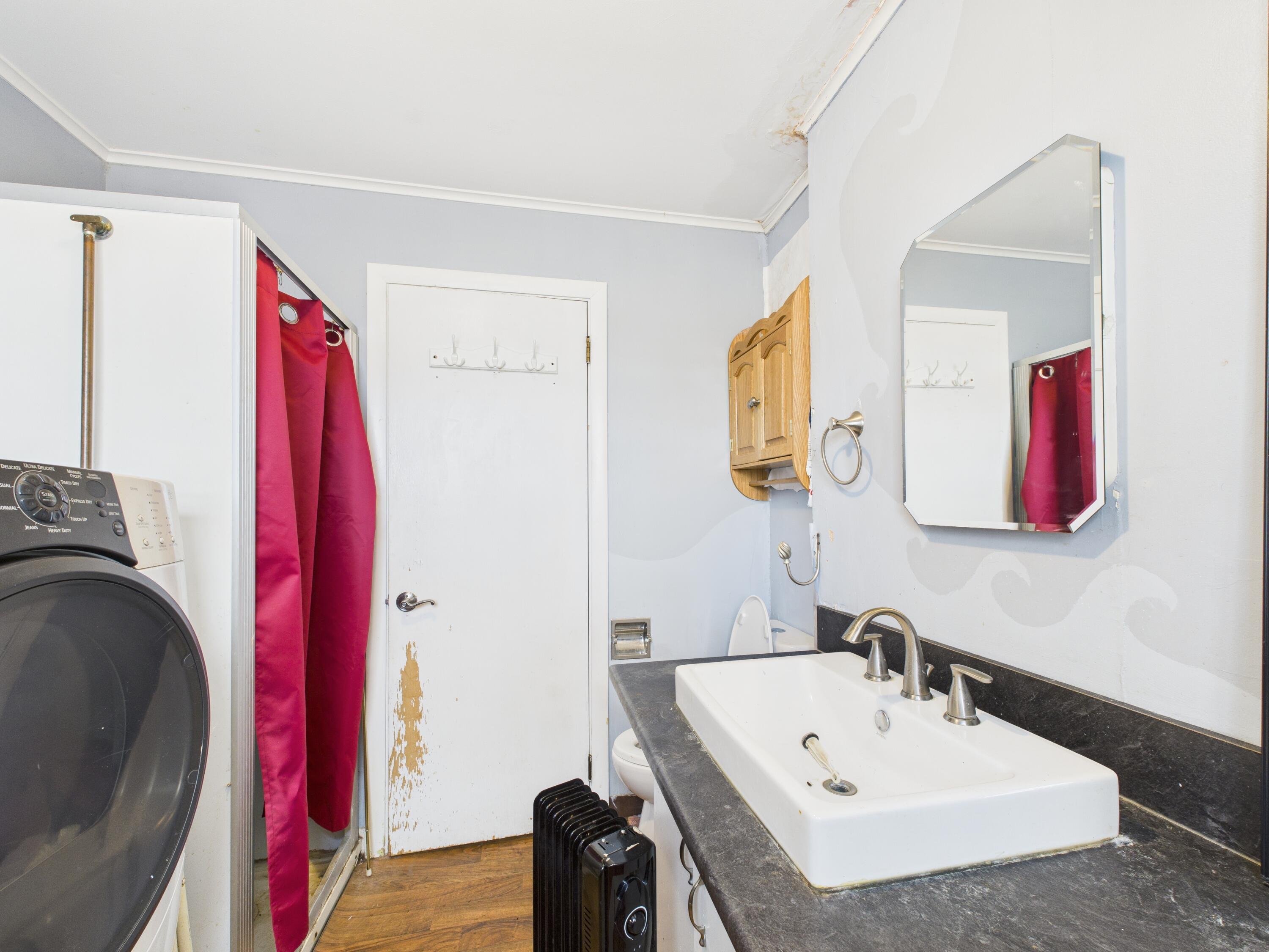 259 Old Washburn Road Caribou, ME 04736 - Photo 15 of 41 1st floor bathroom / laundry