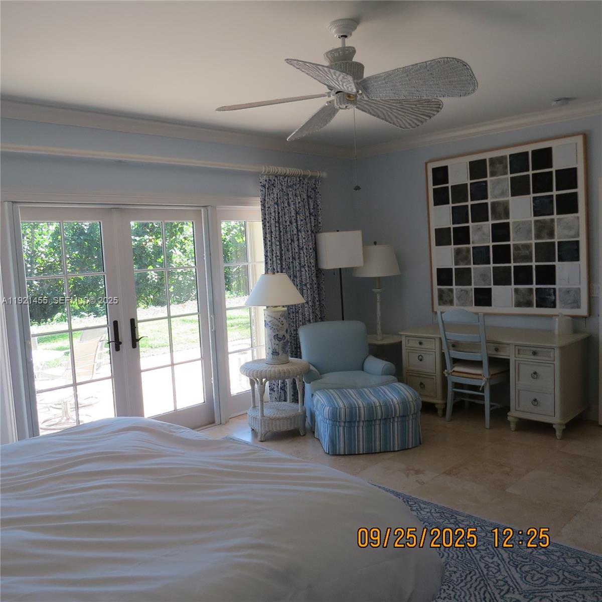 404 South Beach Road, Unit 404 Jupiter Island, FL 33455 - Photo 13 of 23 a living room with furniture and a large window