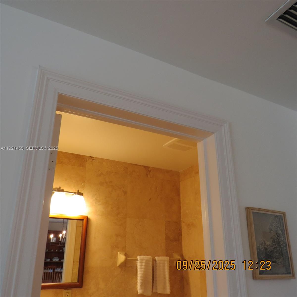 404 South Beach Road, Unit 404 Jupiter Island, FL 33455 - Photo 6 of 23 a view of walk in closet with window