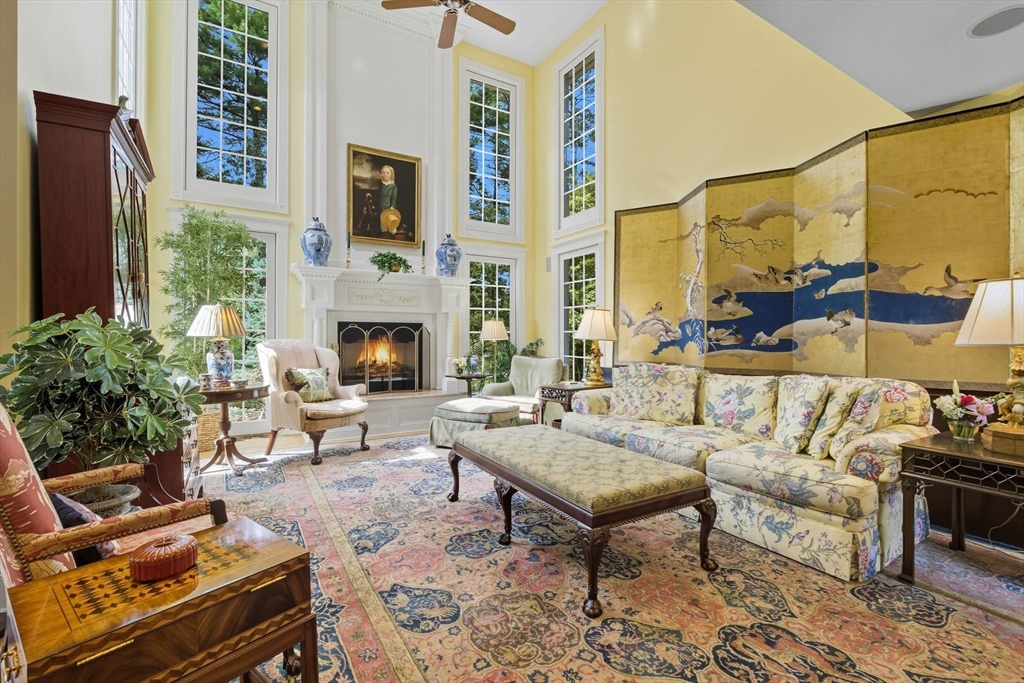 3 Warren Drive Middleton, MA 01949 - Photo 11 of 42 a outdoor living space with furniture and a fireplace