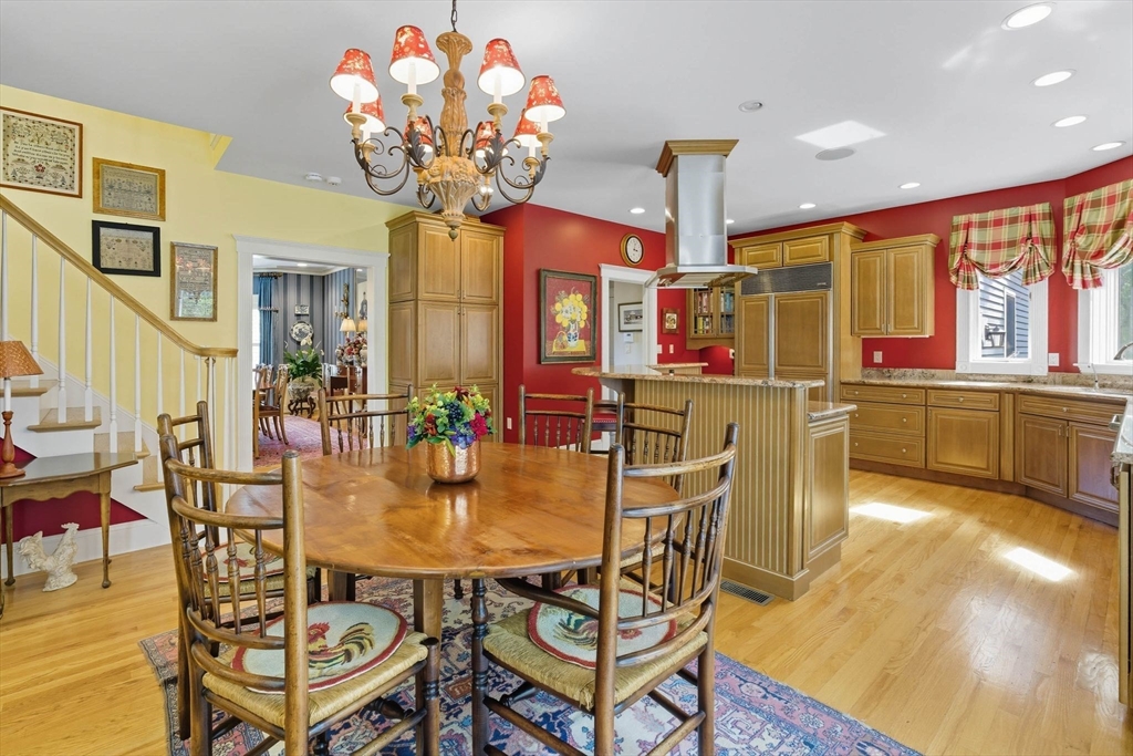 3 Warren Drive Middleton, MA 01949 - Photo 13 of 42 a dining room with furniture and chandelier
