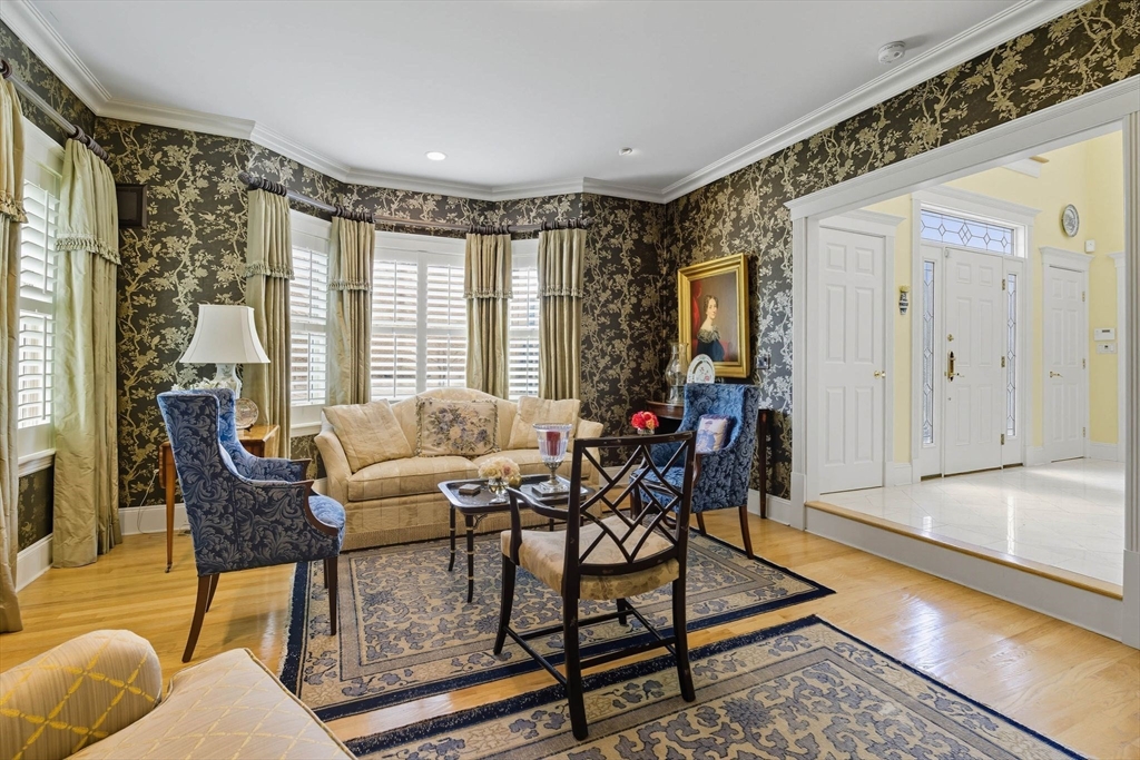 3 Warren Drive Middleton, MA 01949 - Photo 16 of 42 a living room with furniture and a large window
