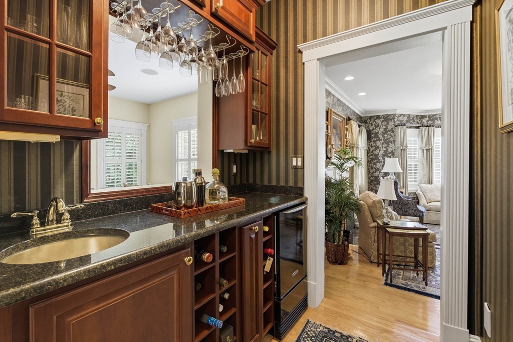 3 Warren Drive Middleton, MA 01949 - Photo 20 of 42 a kitchen with stainless steel appliances granite countertop a sink stove and cabinets