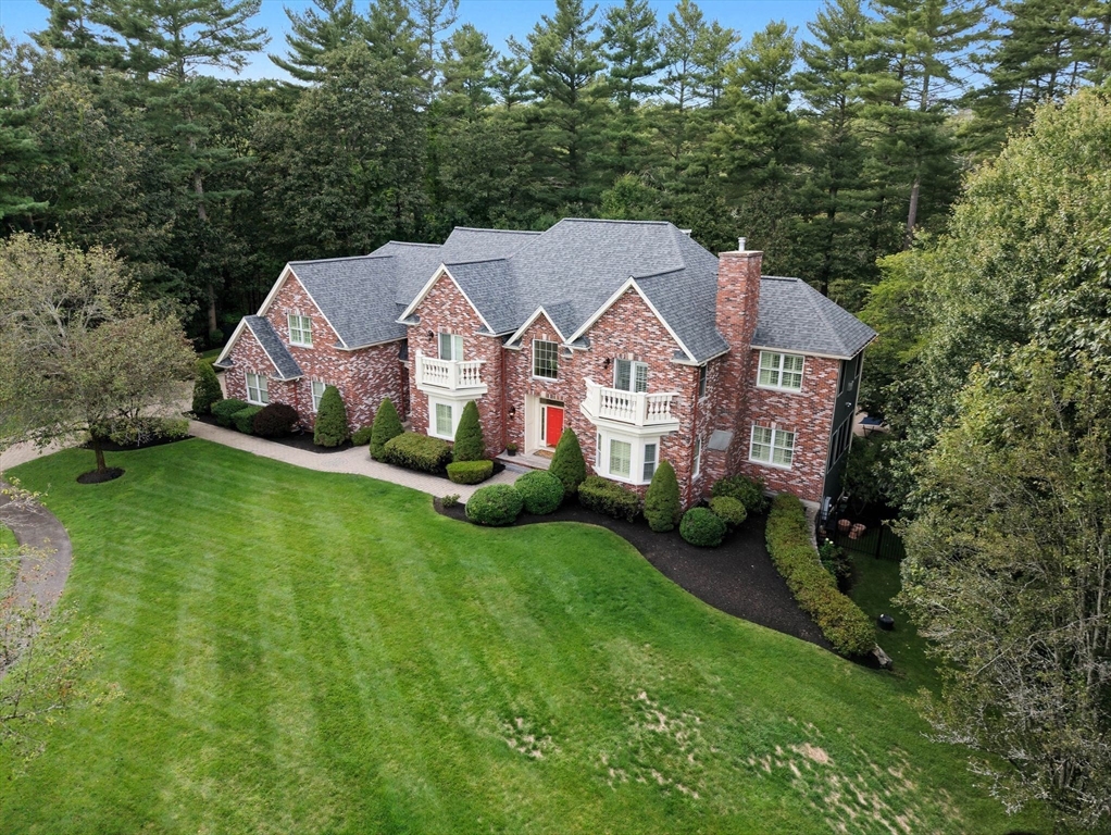 3 Warren Drive Middleton, MA 01949 - Photo 2 of 42 a aerial view of a house with swimming pool next to a big yard