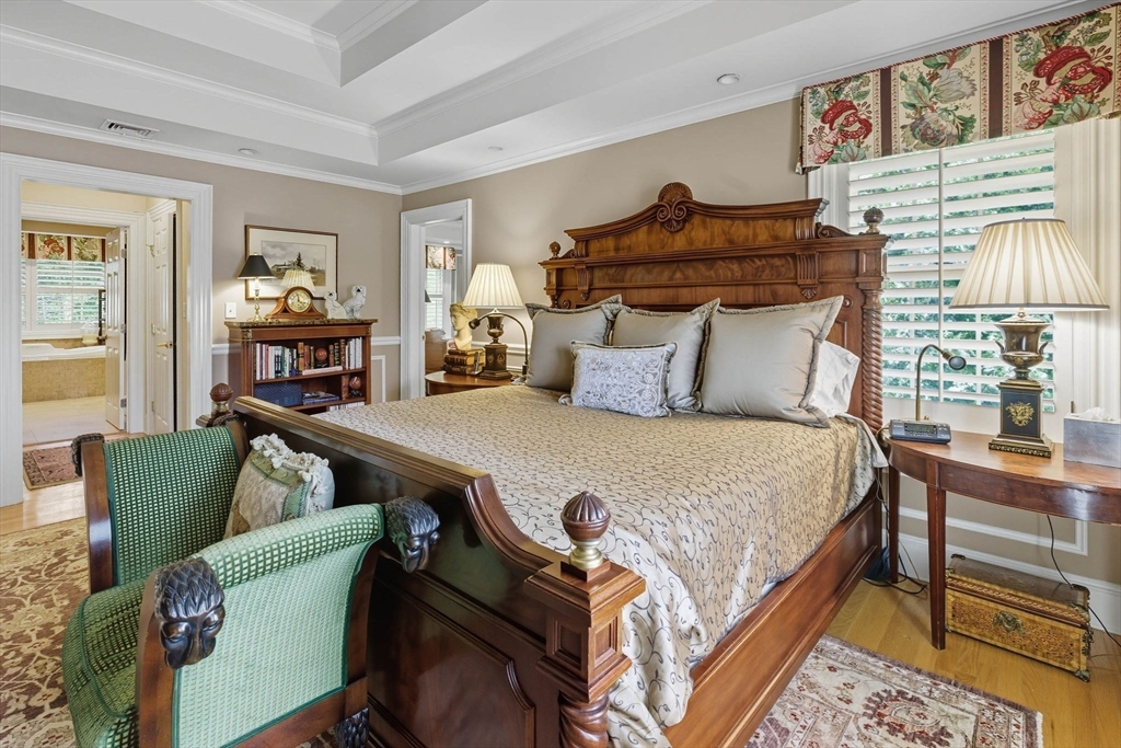 3 Warren Drive Middleton, MA 01949 - Photo 26 of 42 a bedroom with furniture and a wooden floor