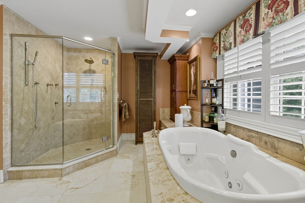 3 Warren Drive Middleton, MA 01949 - Photo 28 of 42 a bathroom with a bathtub and shower