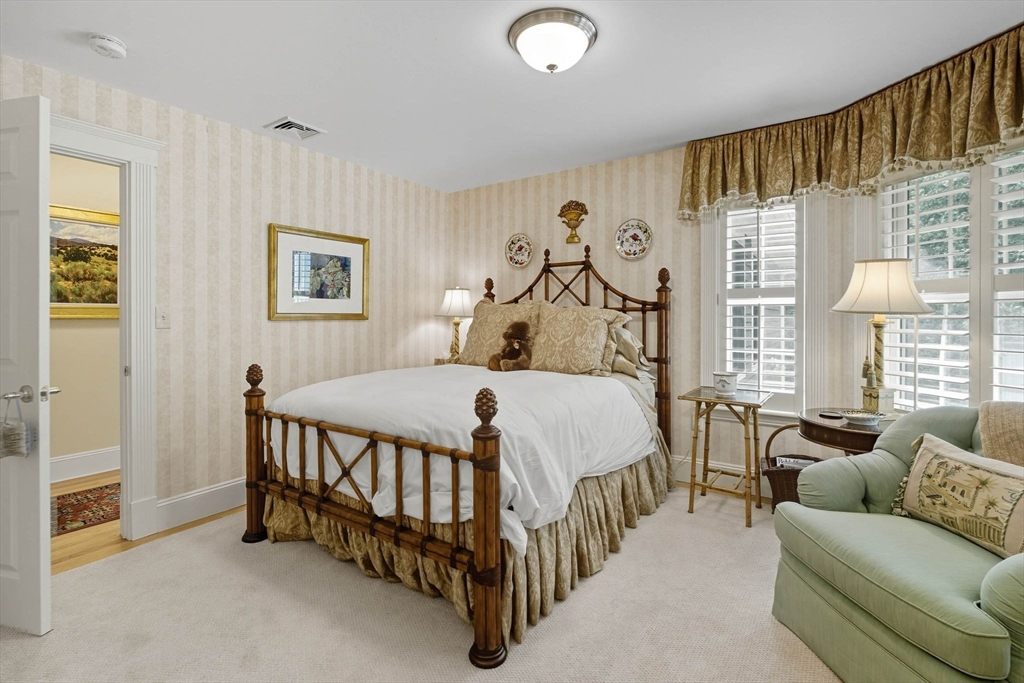 3 Warren Drive Middleton, MA 01949 - Photo 32 of 42 a bed room with a bed and a couch