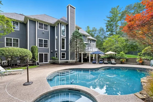 a view of a house with swimming pool