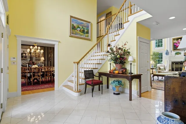 a view of living room with furniture and wooden floor