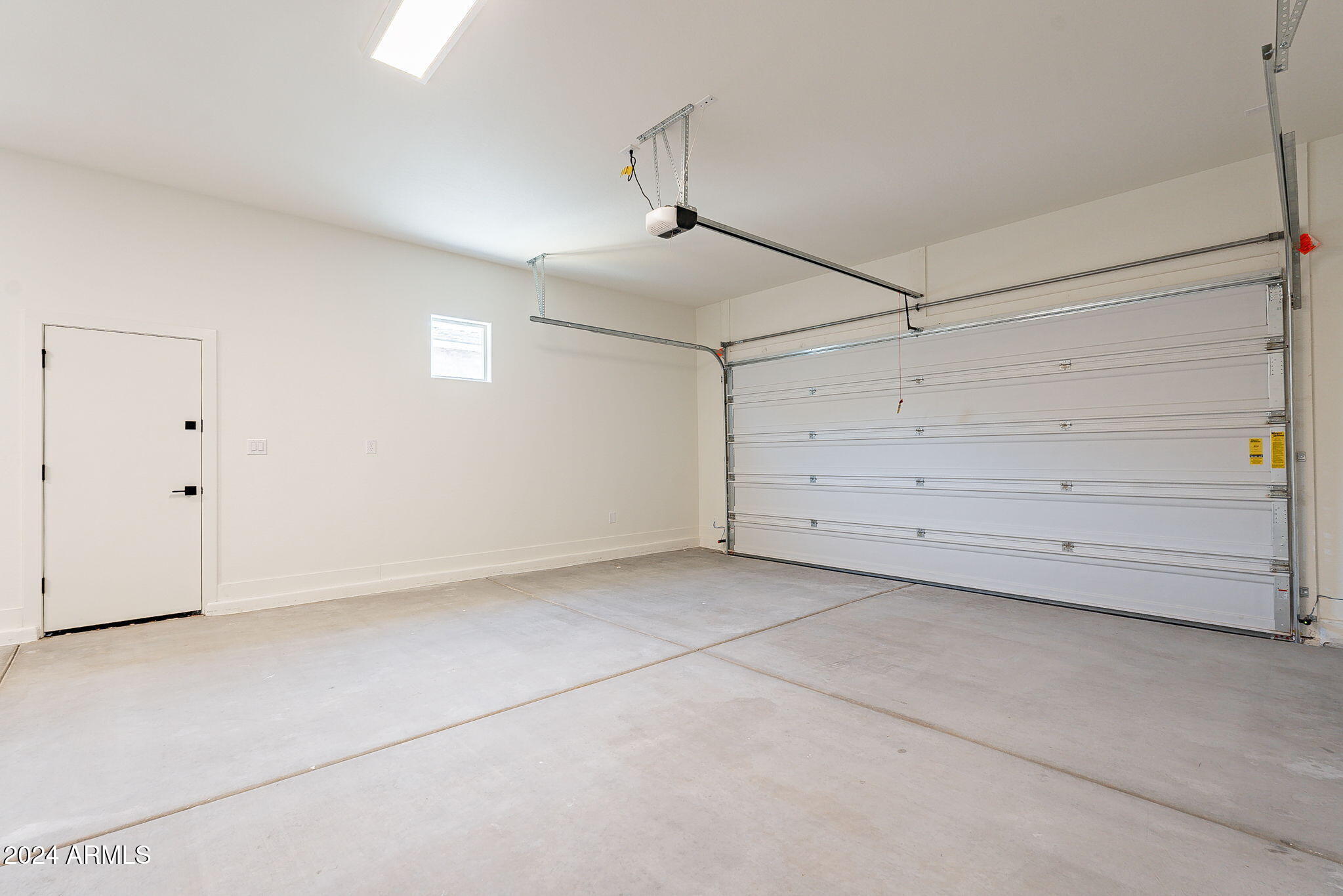 18944 West Ocotillo Road Waddell, AZ 85355 - Photo 26 of 35 3 car garage