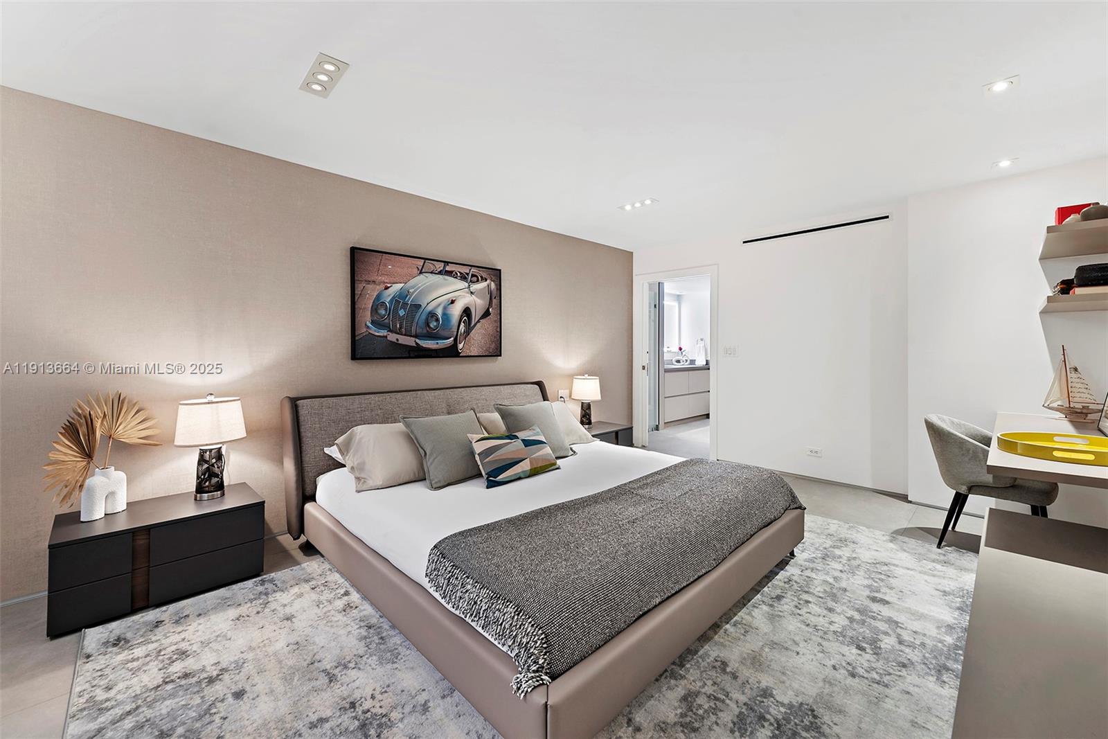 2301 Collins Avenue, Unit 1004 Miami Beach, FL 33139 - Photo 11 of 53 a bedroom with a bed and wooden floor