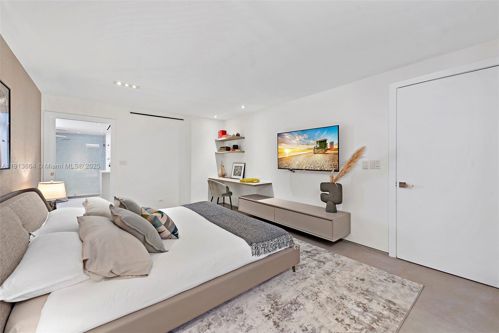 2301 Collins Avenue, Unit 1004 Miami Beach, FL 33139 - Photo 12 of 53 a living room with furniture and a rug