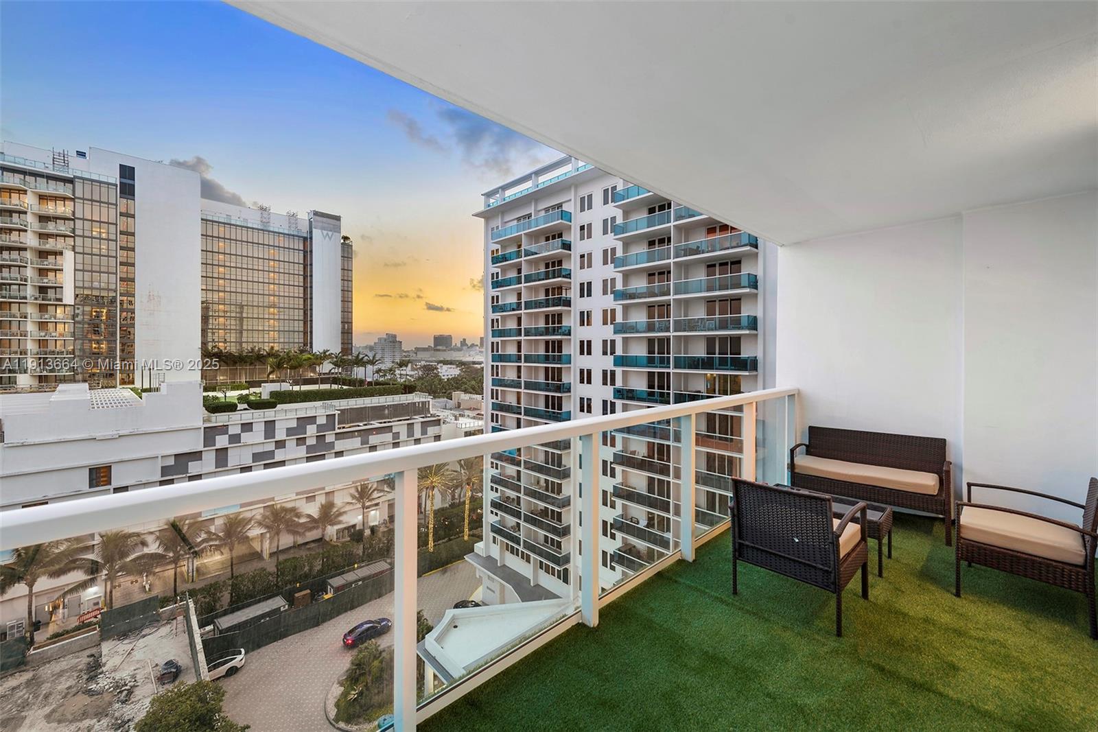 2301 Collins Avenue, Unit 1004 Miami Beach, FL 33139 - Photo 14 of 53 a view of roof deck with a barbeque grill and couches