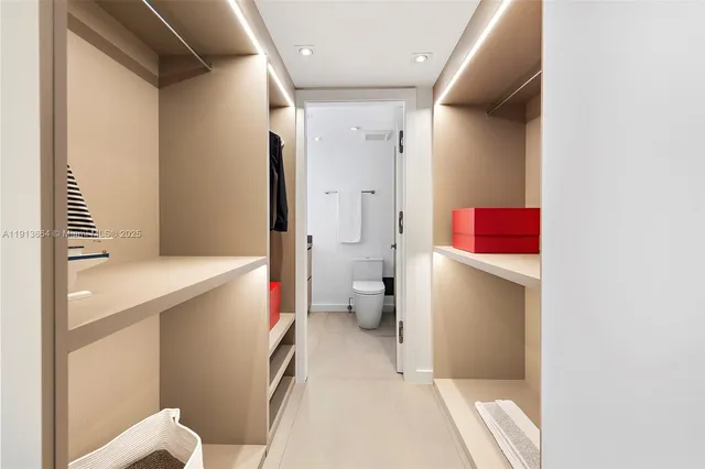 a bedroom with a bed and a desk