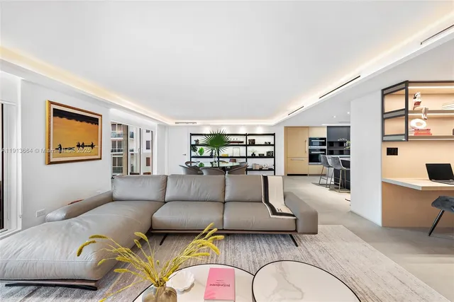 a kitchen with a table and chairs in it