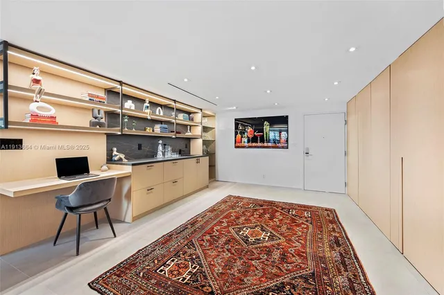 a room with furniture and a chandelier