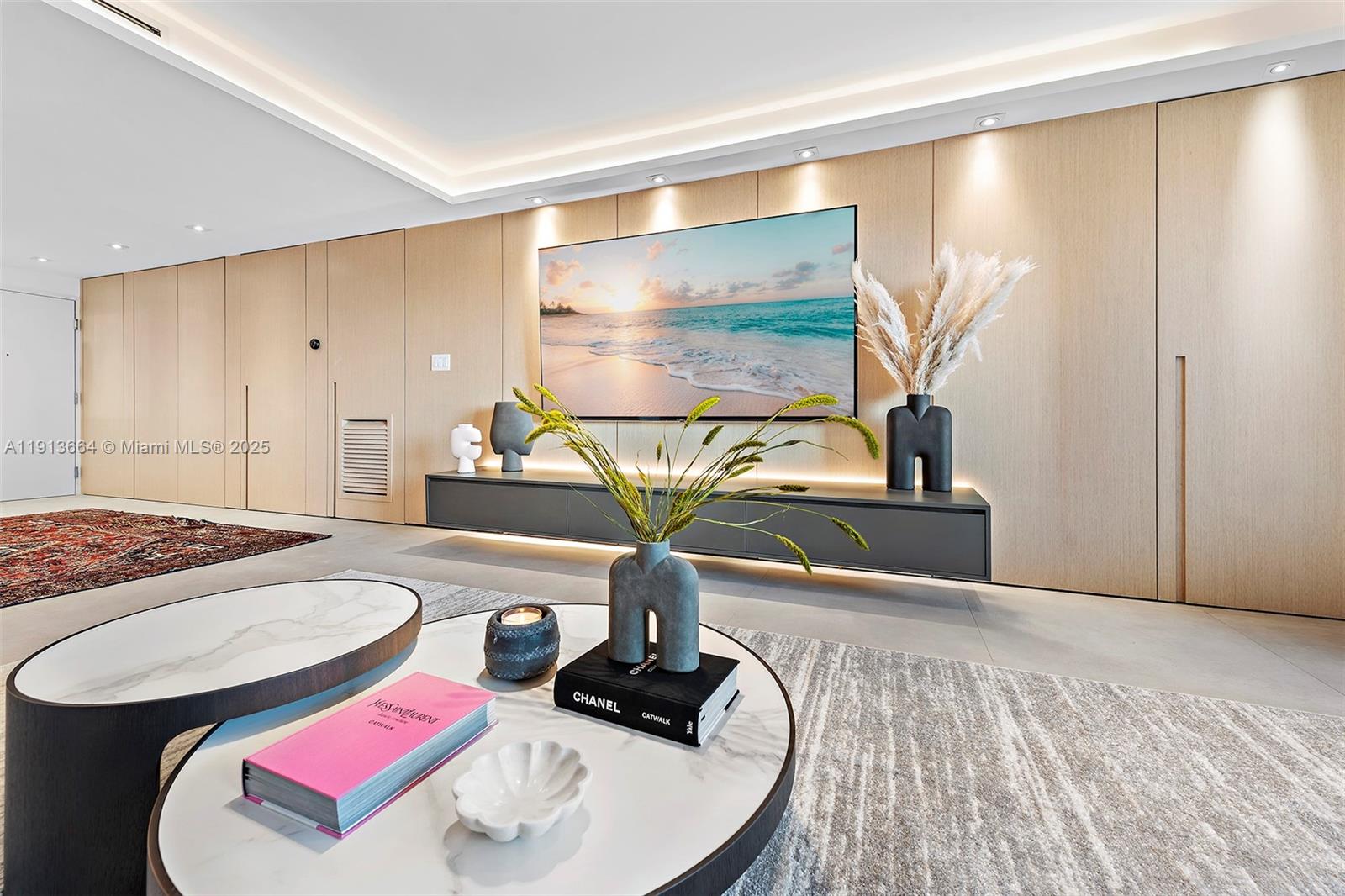 2301 Collins Avenue, Unit 1004 Miami Beach, FL 33139 - Photo 46 of 53 a room with furniture and a chandelier