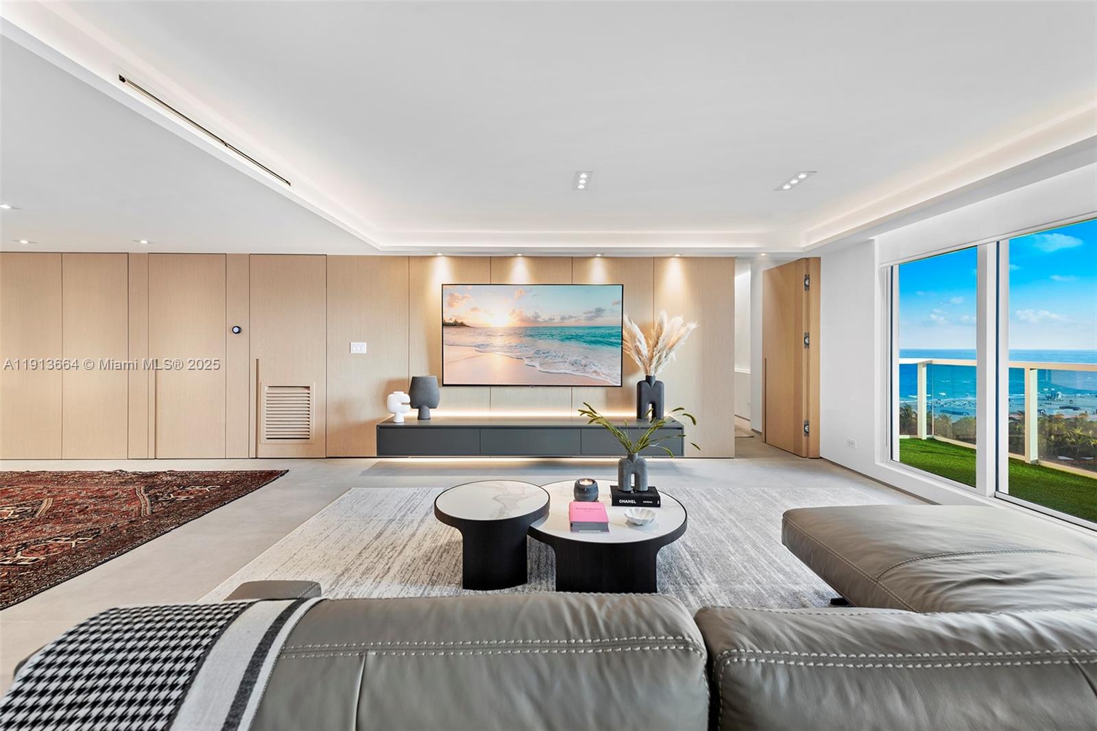 2301 Collins Avenue, Unit 1004 Miami Beach, FL 33139 - Photo 53 of 53 a living room with furniture and a large window