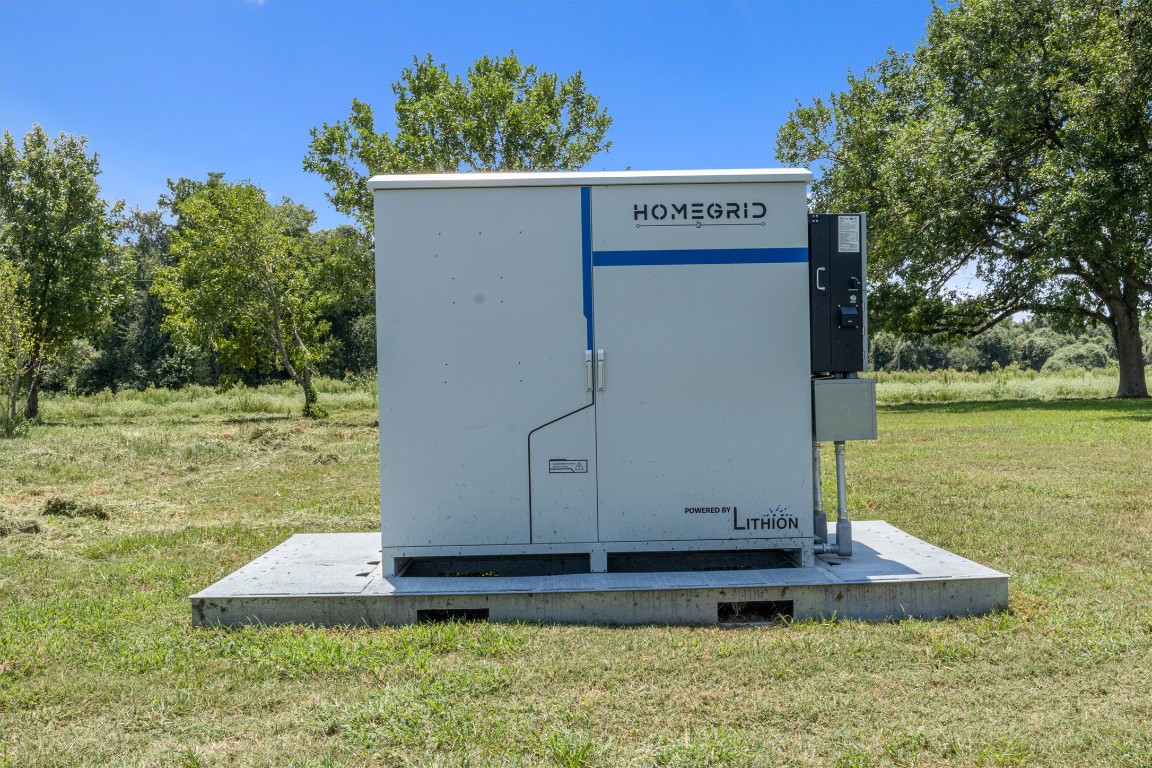 451 Pleasant Grove Road Elgin, TX 78621 - Photo 10 of 26 a view of a water with large trees