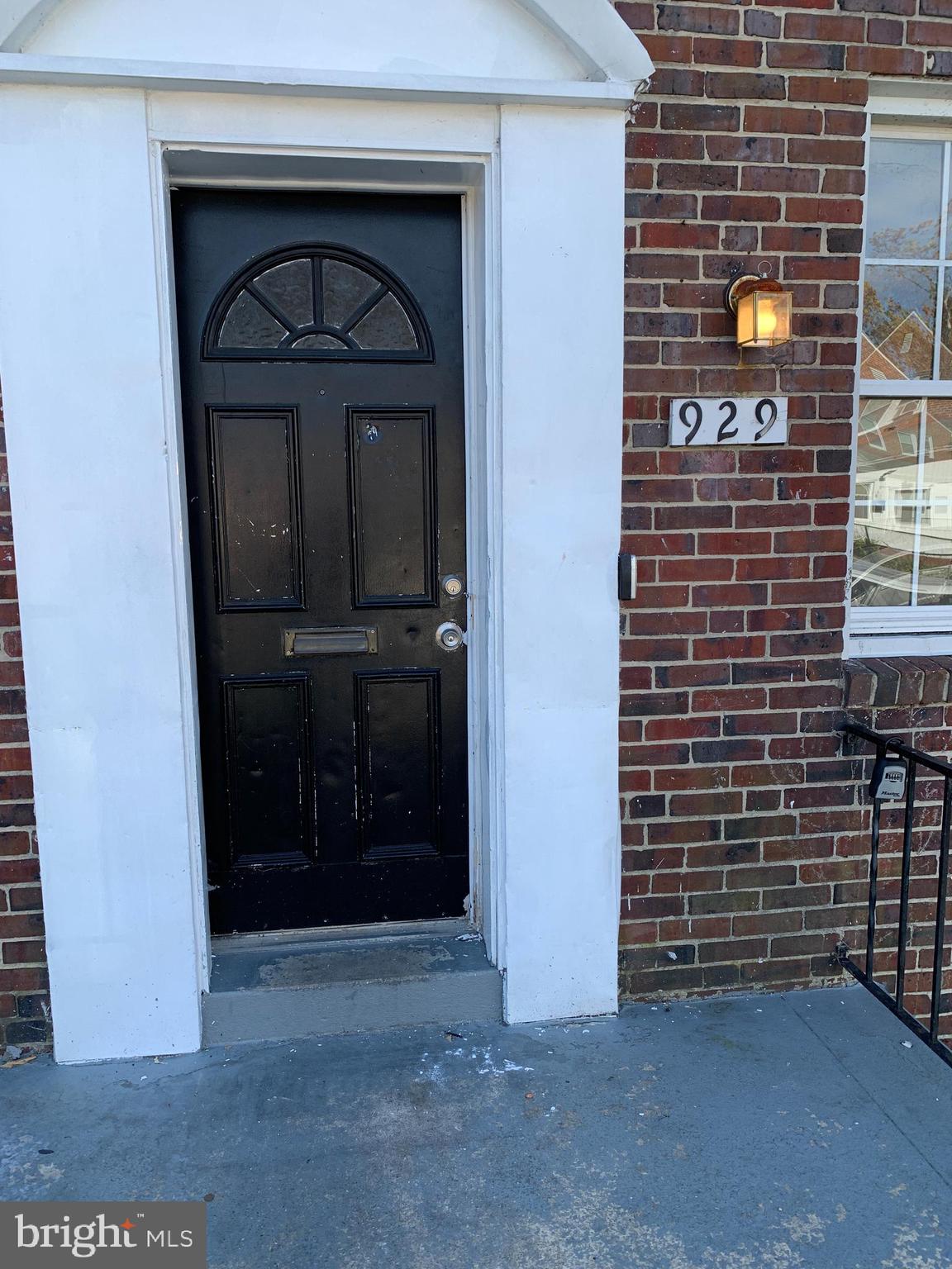 929 East 41st Street Baltimore, MD 21218 - Photo 2 of 18 a view of front door of a house
