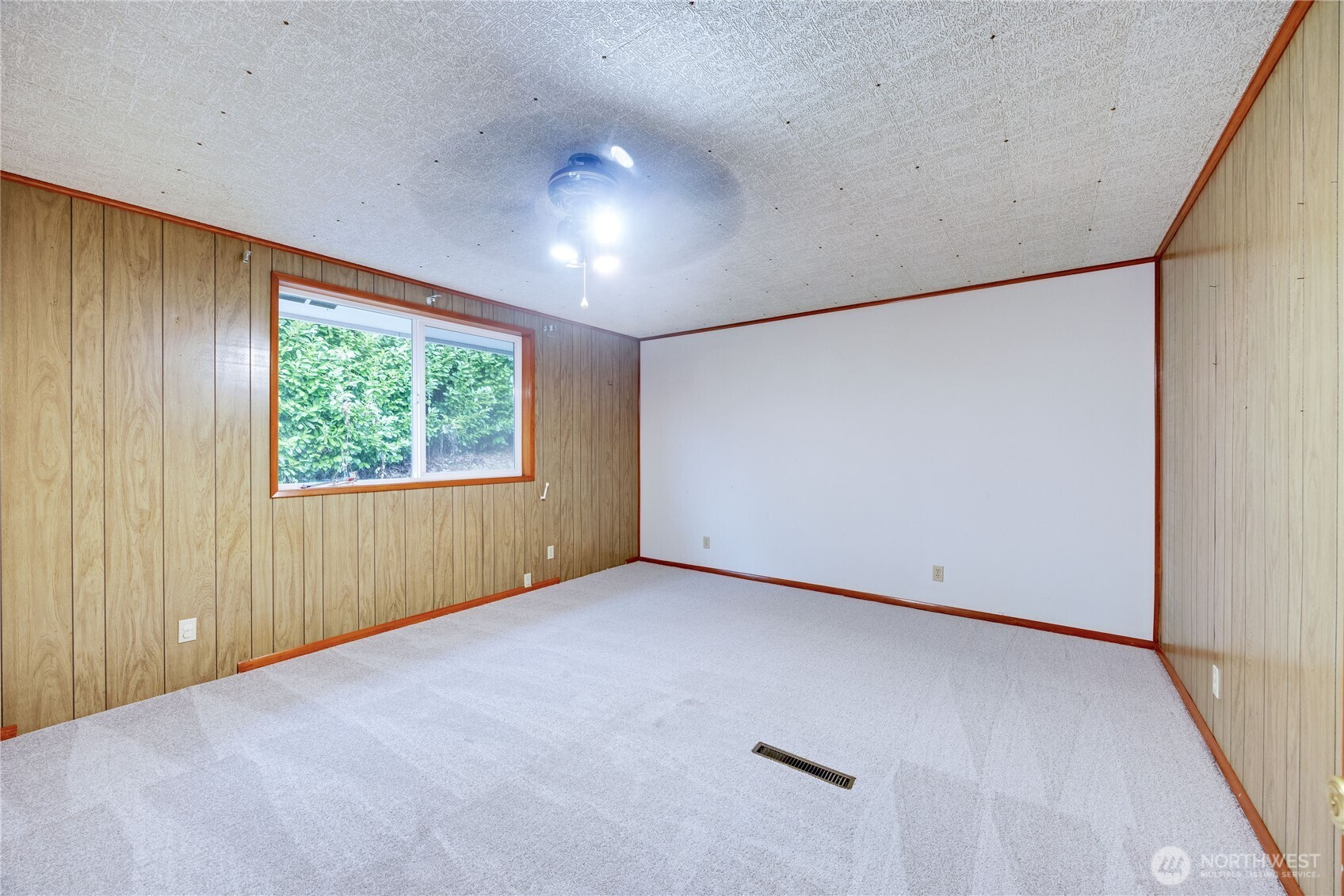 2703 Anderson Hill Road Southwest Port Orchard, WA 98367 - Photo 13 of 27 an empty room with a window