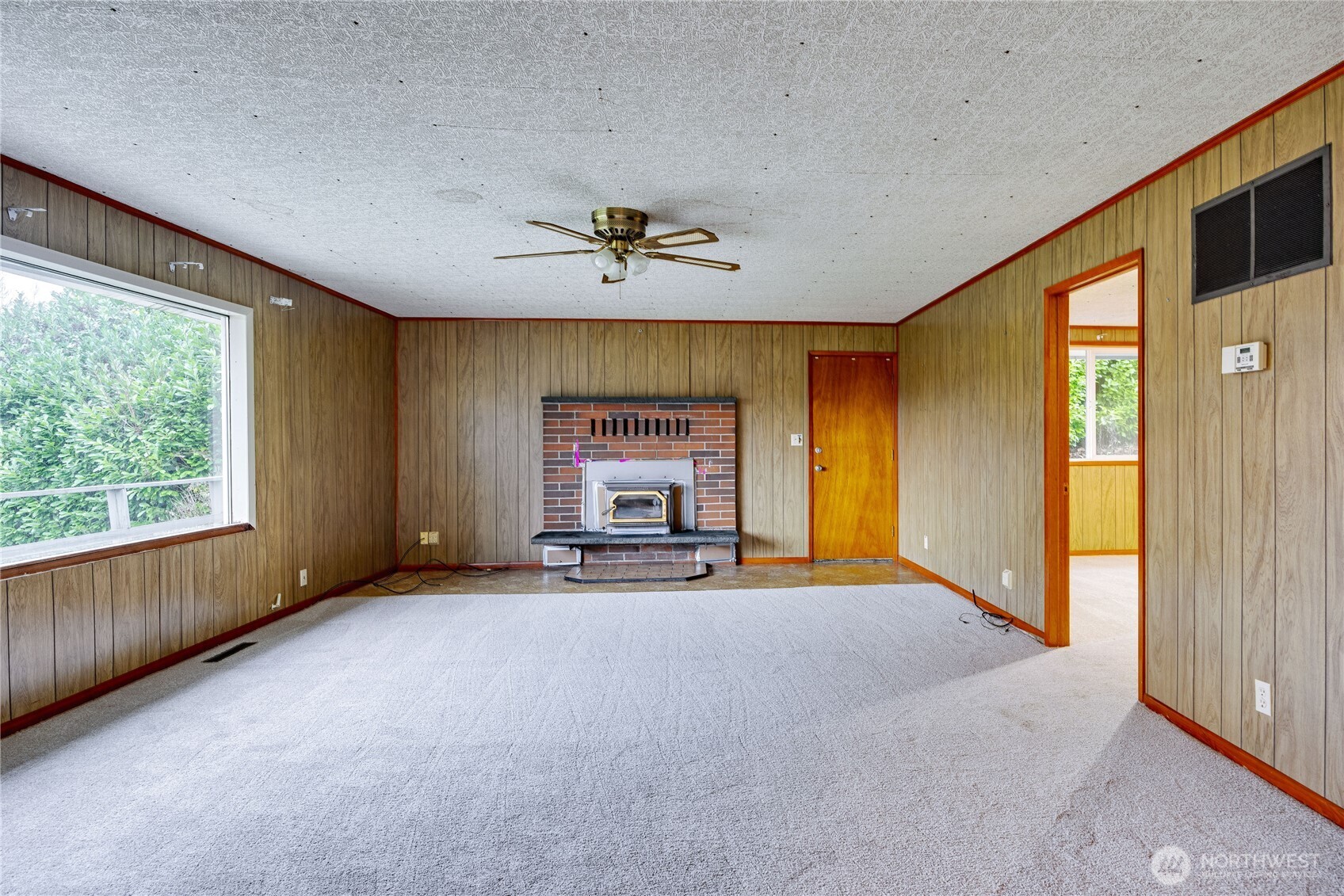 2703 Anderson Hill Road Southwest Port Orchard, WA 98367 - Photo 8 of 27 a view of an empty room with a window