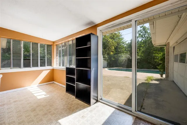 a view of swimming pool from a room