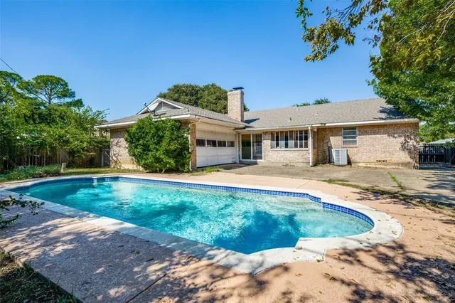 a view of outdoor space yard and swimming pool